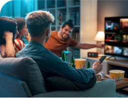 Friends watching movies together at home